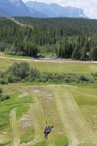 Two people take flight at Alternate Adventures: Jasper-Hinton Zip Line. K. Byrne photo. 