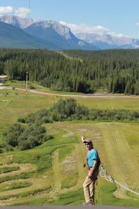 Darrell Bossert stands on the zip line launch pad where he helps others to conquer the same fears he once had. K. Byrne photo.