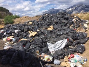 Garbage bags full of ash from campgrounds in Jasper are seen piled up in the transfer station. Jasper Environmental Association wants Park Canada to find a more sustainable to get rid of the ash. Photo submitted. 