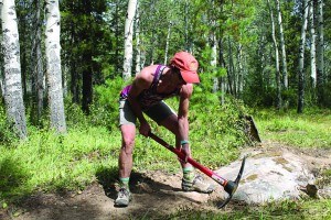 Loni Klettl, a Jasper Trail Alliance leader and one of its founding members works hard a trail along Pyramid Bench. K. Byrne photo