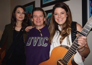Nancy Addison (centre) hosts about six house concerts a year. In November she hosted Anique Granger (left) and Melanie Brulée. C. Gilbert photo. 