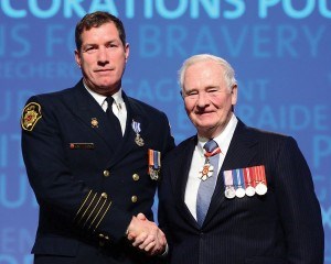 Jasper’s fire chief Greg Van Tighem (left) was presented with the Meritorious Service Medal by Governor General David Johnston in Edmonton on Dec. 8. Submitted photo