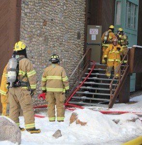 Police charged a 27-year-old man with arson after an apartment fire at the Cavell Aparments, Dec. 12. K. Byrne photo. 