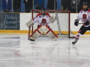 Bearcats goaltender Jake Melanson sets up for a shot as Matthew Park patrols the front of the net. P. Clarke photo