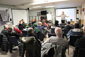 Doug Wyseman, a risk management consultant, spoke to more than 20 residents during a public forum, to discuss the town’s tobogganing closures, Feb. 6. P. Clarke photo. 