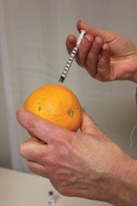 More than 40 residents learned how to inject naloxone using oranges during a workshop hosted by HIV West Yellowhead, March 17. P. Clarke photo.