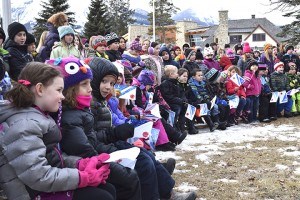 Students from Jasper’s three schools gathered for a flag raising ceremony at Jasper Elementary School to mark the beginning of Rendez-vous de la Francophonie, March 2. Craig Gilbert photo.