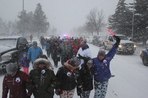 Dozens of residents turn up in their pajamas, March 3, to march through town to raise awareness about autoimmune diseases. P. Clarke photo.
