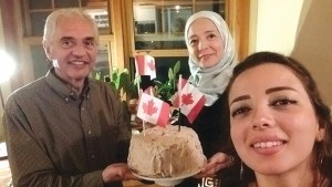 Hassan El Azem (left), Omayea El Marawi (centre) and Reham Al Azem enjoyed a birthday cake to celebrate El Marawi’s first Canadian birthday. The cake was made by Nancy Addison to mark the special occasion.Submitted photo