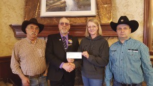 MLA Eric Rosendahl presented a $43,000 cheque to the Jasper Heritage Rodeo Association, March 10.  P. Clarke photo