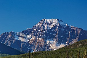 .Mount Edith Cavell (pictured here) is one of the most popular summer use areas in Jasper National Park. People who want to visit the area will need to pick up a free parking permit located outside the Information Centre between 8 a.m. and 10 a.m. daily. | Wikimedia photo.