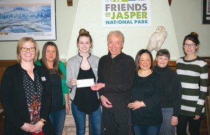 From left to right: Susan Cesco, Heather Aussant Roy and Sarah Butterfield accepted the 2017 Oka Sushi chopstick locker donation of $3,160 from owners Tatsuhiko and Rieko Okazaki on April 27 as servers Joann Black and Anna McAlary look on. C. Gilbert photo.