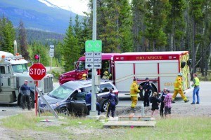 An accident between a tractor trailer and a mini-van temporarily closed a section of Highway 16 on May 12. P. Clarke photo.