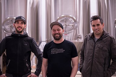 Aric Johnson, Jason Griffiths and Dave Mozel at the brand new Folding Mountain Brewery near Hinton. 