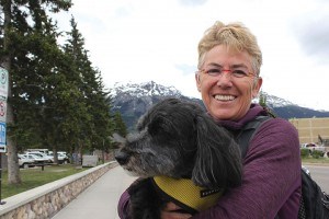Uli Schackmann and her dog Jackson are cycling from Alaska to Florida to raise money and awareness about AIDS. P. Clarke photo.