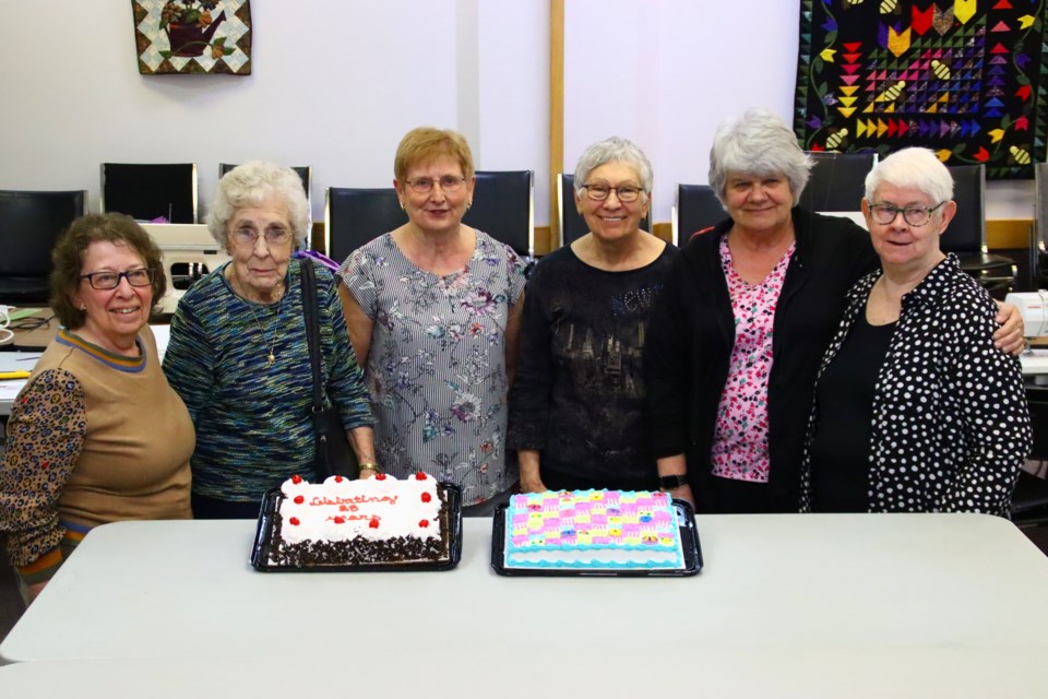 North Star Quilt Guild charter members Lorna Heuchert, Marg Harrower, Marg Faktor, Rae Baumgartner, Sandra Dixon and Evelyn Black (missing Linda Lautamus) pose together during the guild's 25th anniversary celebrations May 6.