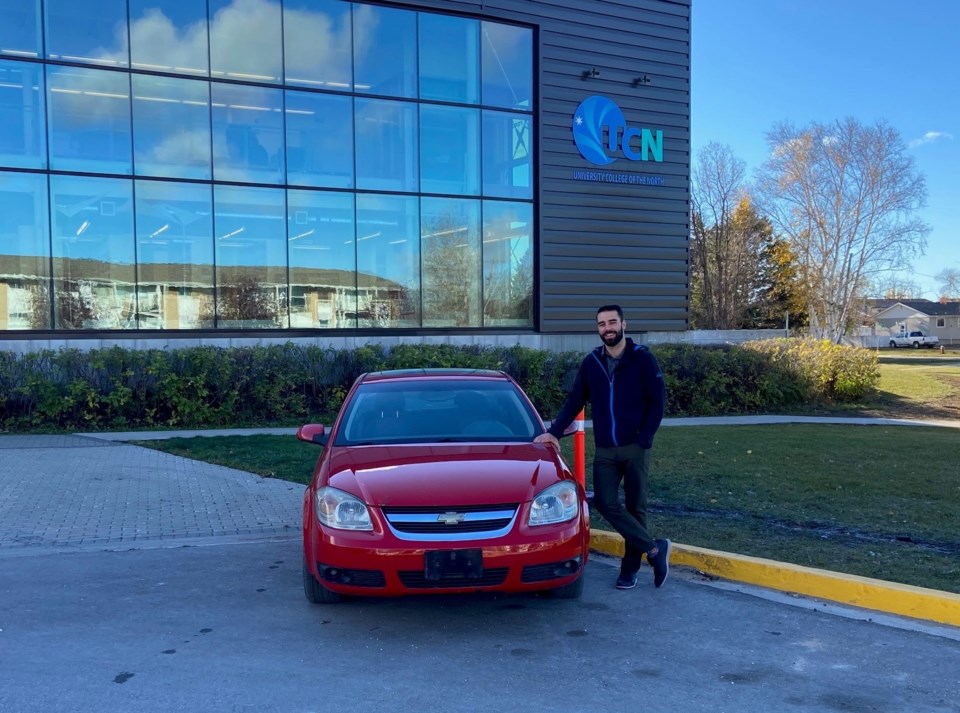 Brandt Weldon with the donated vehicle