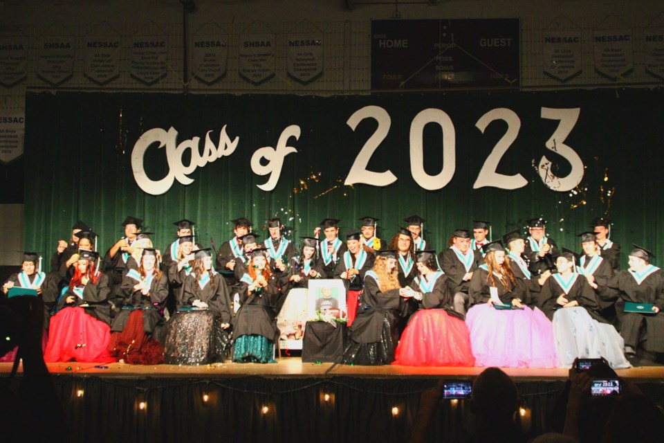 Creighton Community School's 2023 graduating class sets off confetti cannons at the end of the ceremony.