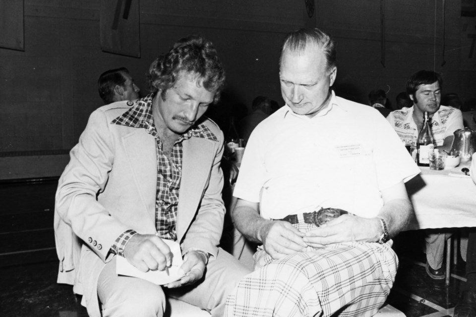 Gerry Hart and Lou Parres, seen here during the 1977 Hudson Bay Mining and Smelting Sports Night in Flin Flon.