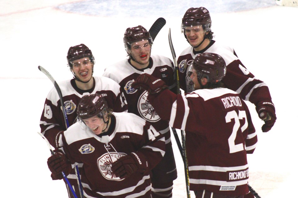 Cole Duperreault, Jacob Vockler, Jeremi Tremblay, Lucas Fry and Reece Richmond celebrate
a goal together. The three players on the left have each missed significant time down the stretch due to injuries, but the Bombers dug deep to win six of their last nine games. All five players played Estevan in last year's SJHL final.