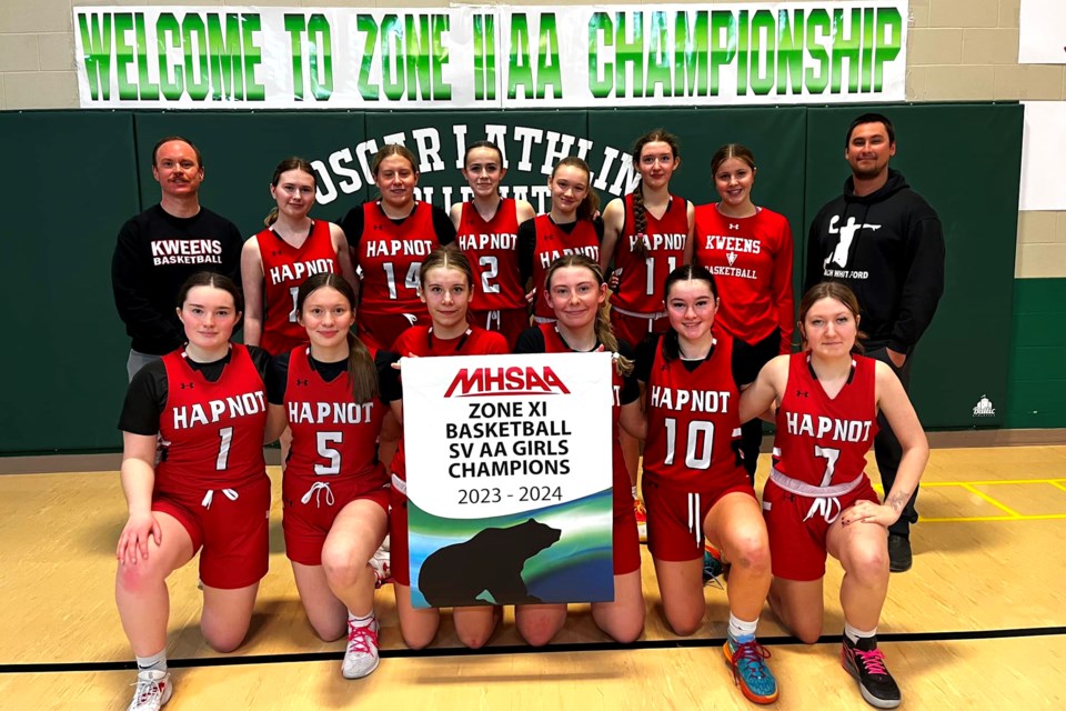 The Hapnot senior Kweens hold up their Zone 11 banner, winning the tournament held at Oscar Lathlin Collegiate last weekend. The Kweens will move on to provincials later this month.