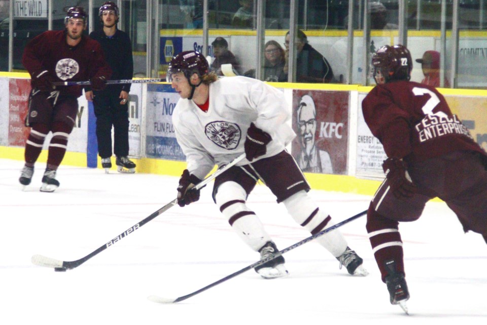 Justin Lies, clad in new Bomber maroon and white gear, cuts through the zone during the Bombers' maroon and white game Sept. 3. Lies, who is from Flin Flon and played the last four seasons in the WHL, will join his hometown team for his final junior season.