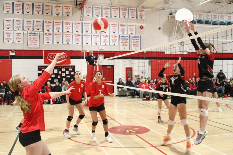 Hapnot JV Kweens Teslynn Beauchamp, Sadie Hynes and Blake Shirran (right) brace for the ball while Goose Lake High Angels players send the ball back over the net during JV girls' volleyball provincials at Hapnot Nov. 23. Flin Flon hosted the provincial tournament last week - the Kweens beat high-ranked teams, but ultimately finished seventh.