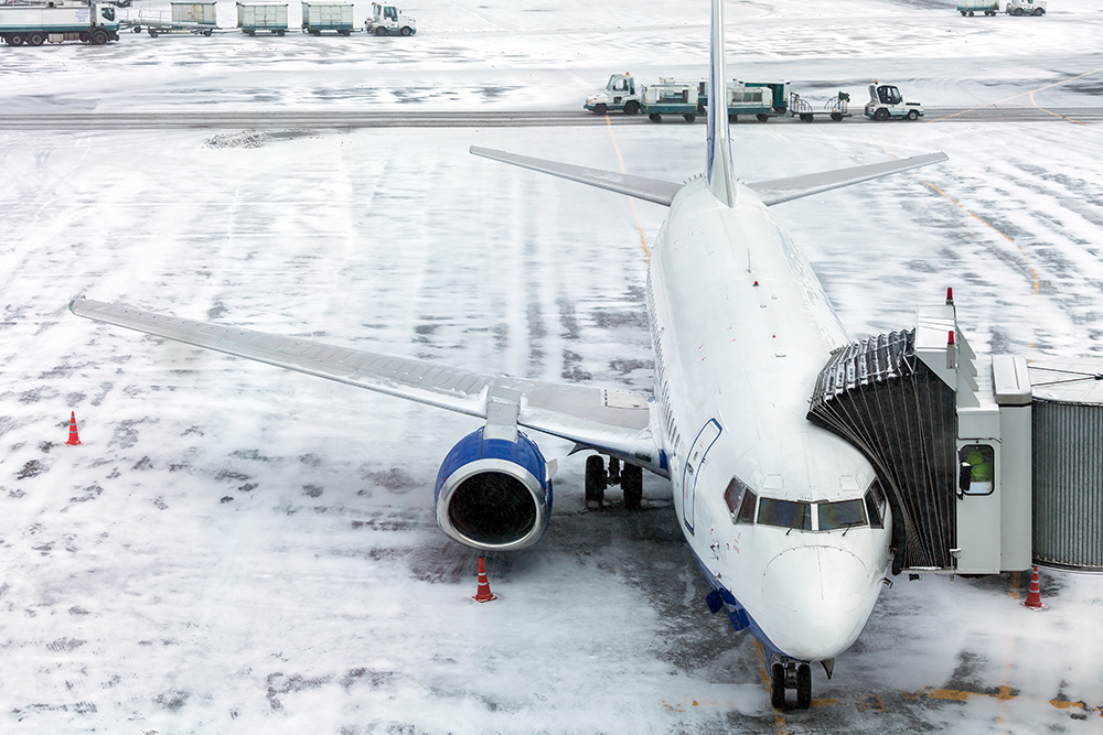 Snowfall Causes Flight Cancellations and Delays at Reagan National Airport