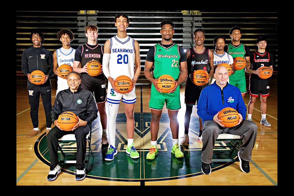 Some of the players chosen to the 6D North Region all-region boys high-school basketball teams attended a recent group photo session at Wakefield High School. Region co-coaches of the Year, Tony Bentely, sitting in front, and Mike Desmond, right, also were present.