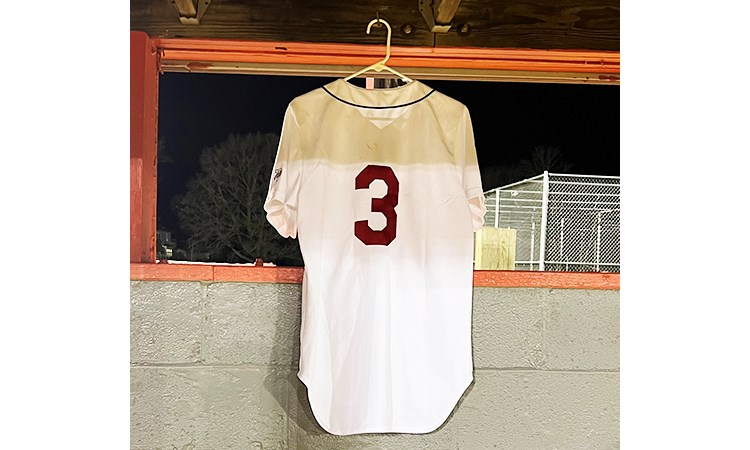Drew Stieg's jersey was hung from the McLean High School baseball dugout during a March 16 ceremony in his memory.