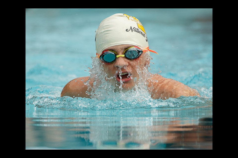 Tuckahoe's Jack English swims the boys age 11-12 breaststroke in a meet last summer. 