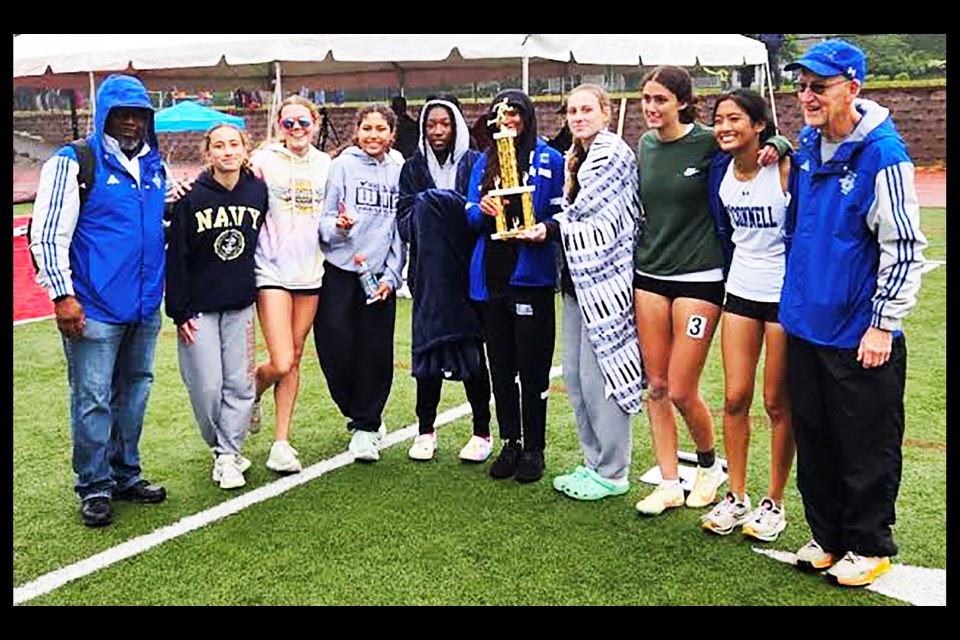 The Draper Invitational champion Bishop O'Connell girls teams gathers with the winning trophy.