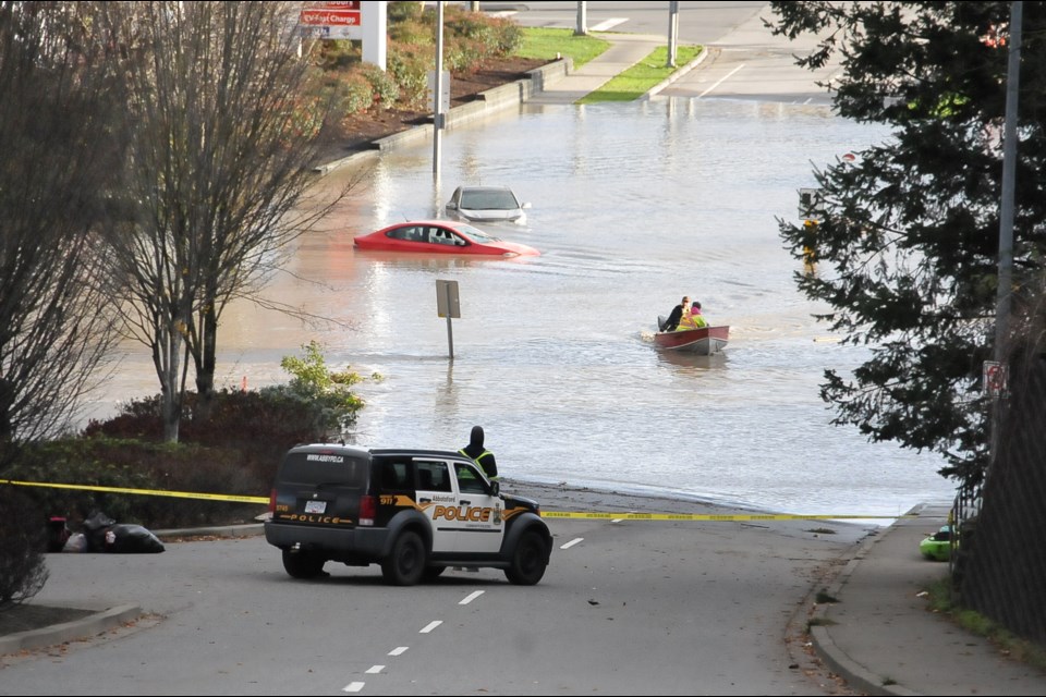 Officials are asking people to stay away from floodwaters so emergency personnel can do their work.