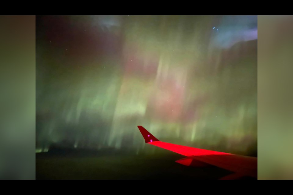 During an overnight flight over B.C., a woman witnessed the northern lights. 