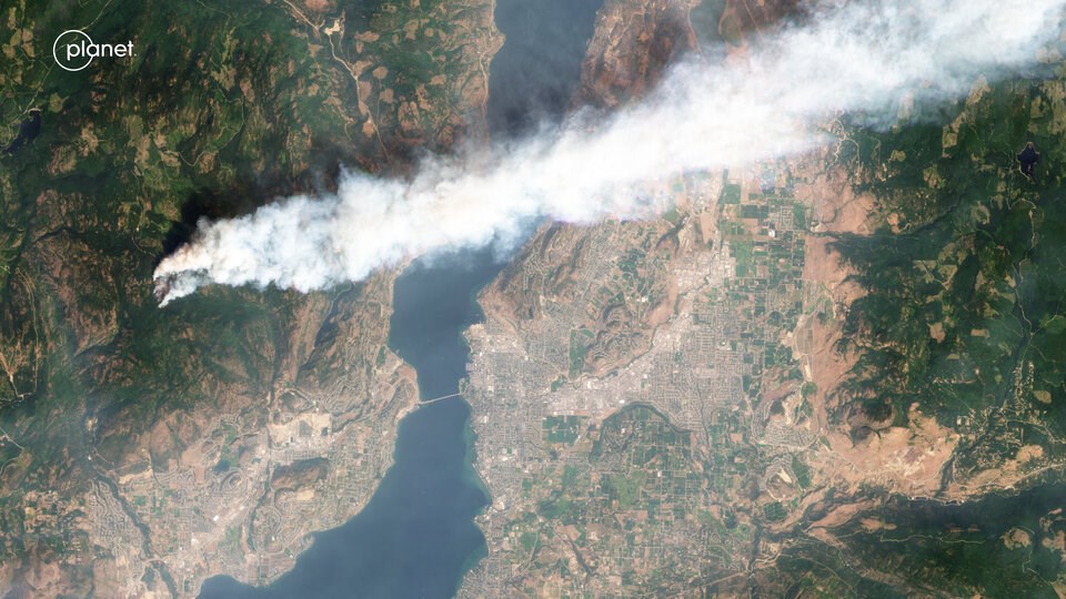 The McDougall Creek wildfire captured by a satellite-mounted camera at 11:08 a.m. PDT. The fire exploded in size and intensity over the coming hours.