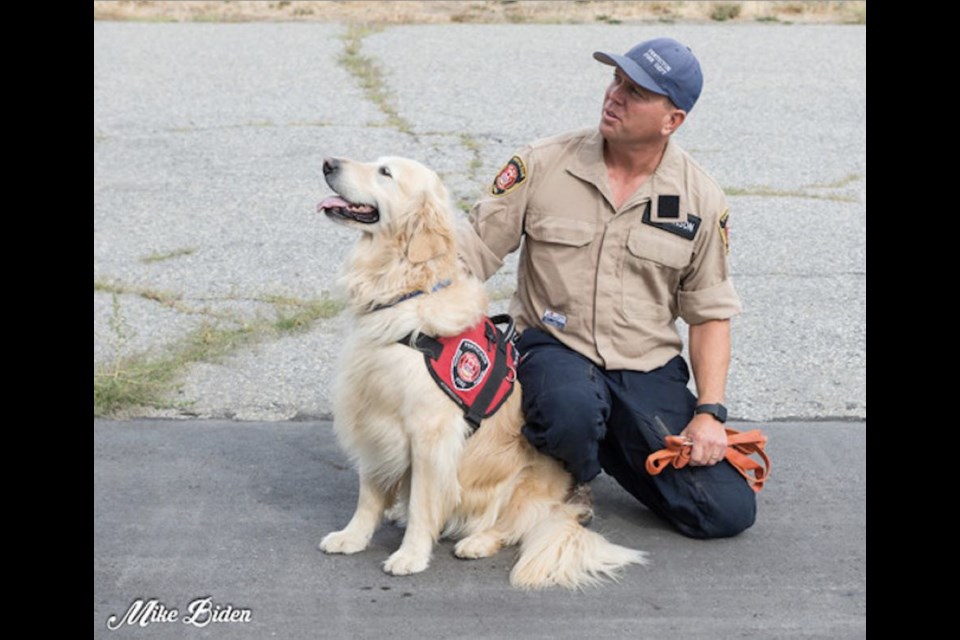 Penticton fire chief Larry Watkinson said his dog was also an "amazing humanitarian."