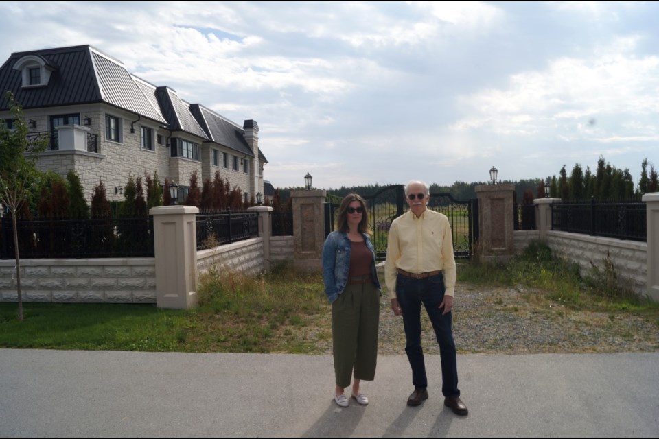 Richmond resident Laura Gillanders (left) and John Roston of Richmond FarmWatch.