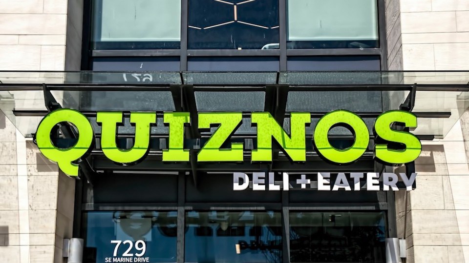 The Quiznos branding at its SE Marine Drive store has lime green branding unlike the olive green and red branding at other Vancouver stores.