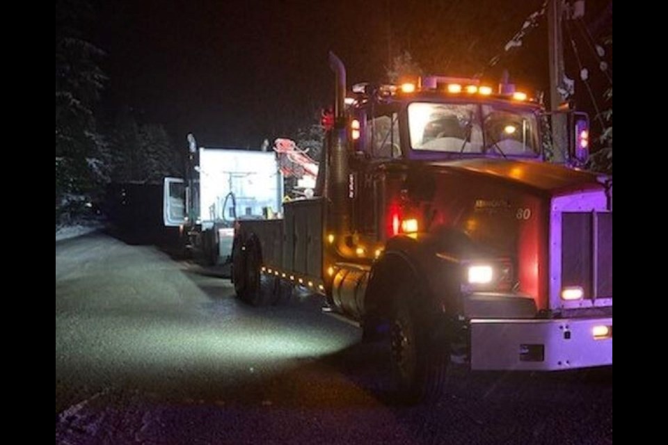 A commercial truck being towed after being clocked going 96 km/h in a 50 km/h zone on Highway 3 on Monday.