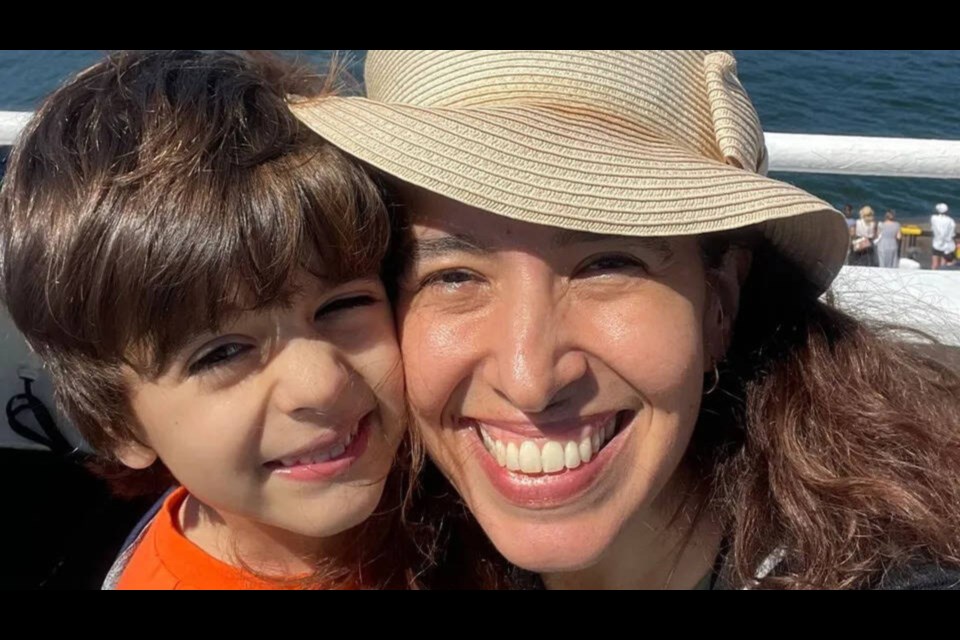 Silvana Schramm with her son Leonardo Machado on a boat. | Courtesy of Theresa Morrison