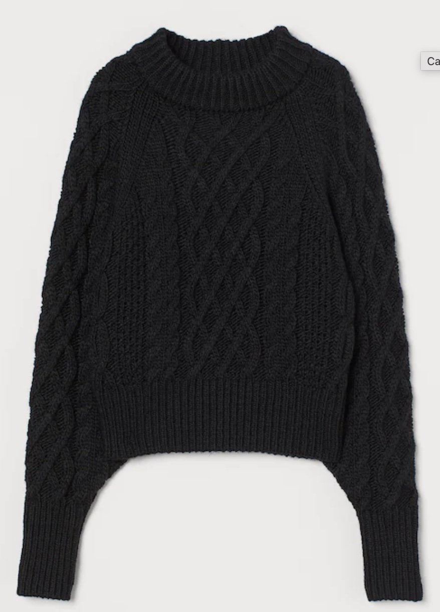 Cableknit sweater.