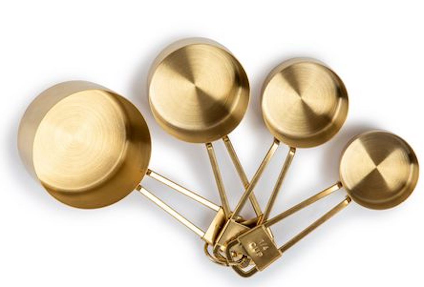 Stacking gold measuring cups