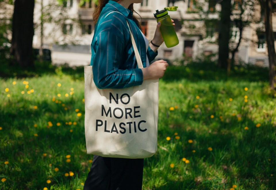 reusable cotton zero waste bag with text No More Plastic