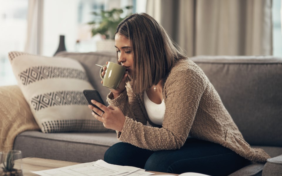 woman sips coffee