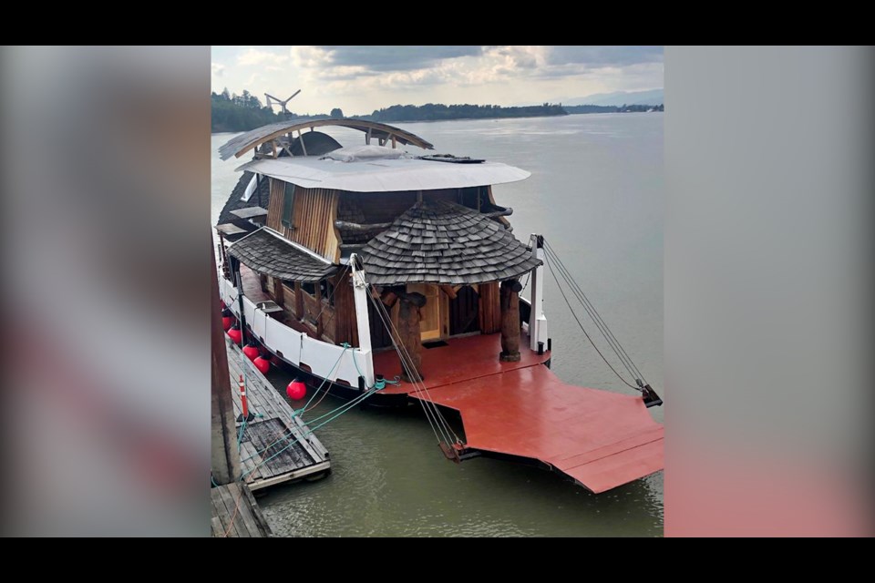 The float home's entrance and deck. 