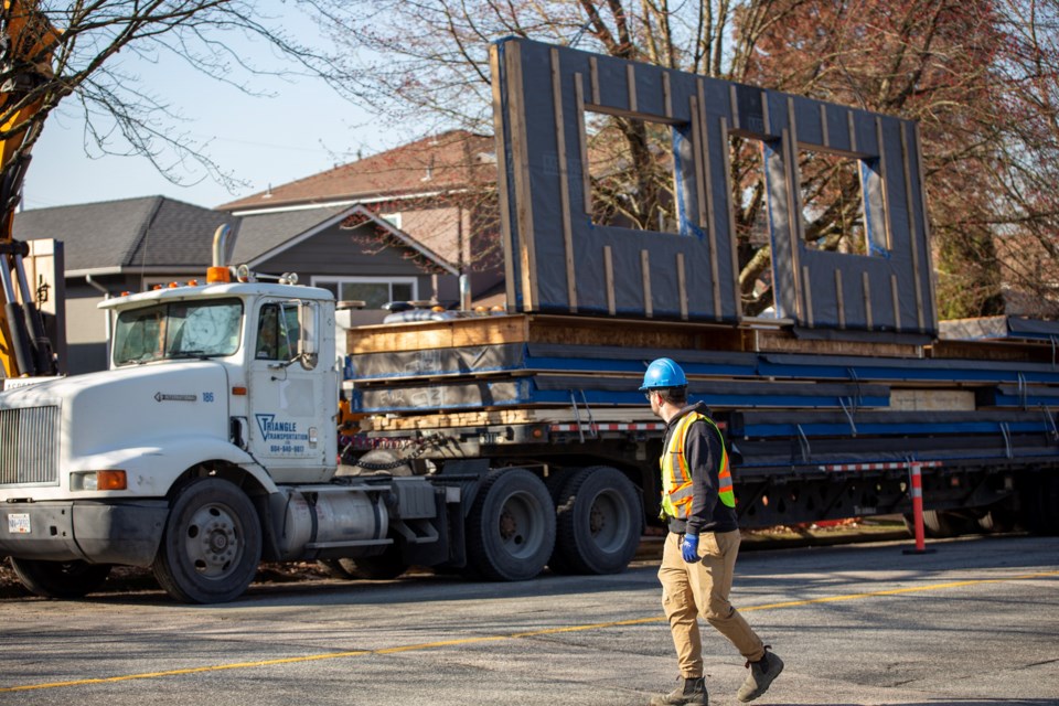 The panels used to construct the project frame were transported by truck from the factory setting to the site in Vancouver. 