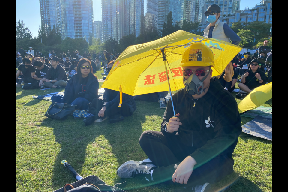 This man wore a gas mask and yellow umbrella to commemorate the Hong Kong protests of 2018 and 2019, where millions attended in defiance of the Chinese Communist Party's takeover of Hong Kong's legislature, police force and legal system.
