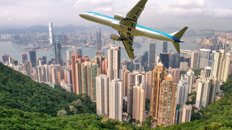 airplane_over_hong_kong_shutterstock