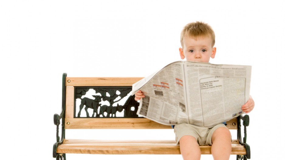 babyreadingnewspapershutterstock