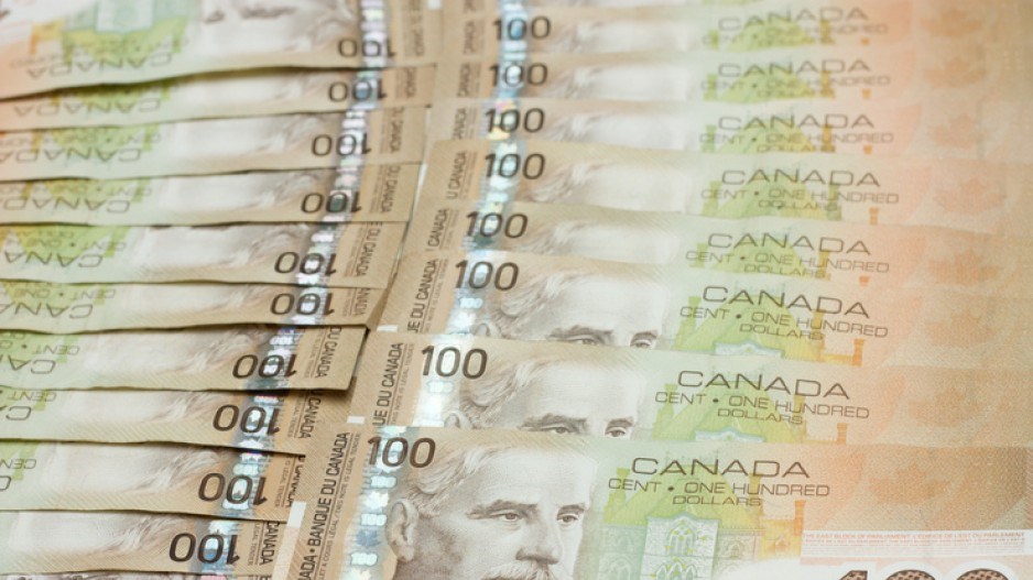 canadian-100-dollar-bills-rusfaz-istock-gettyimagesplus